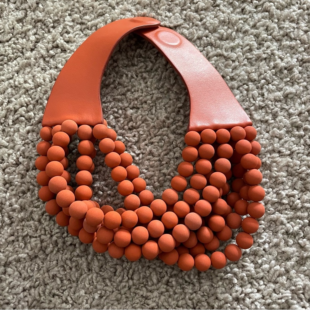 Fairchild Baldwin matte orange beaded necklace with magnetic closure